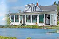 Renovated Farmhouse with waterfront at Bras d’Or Lake on 11 acres for sale on Cape Breton Island, Nova Scotia, Canada
