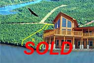 Lot 6 property with waterfront at River Inhabitants near Port Hawkesbury for sale on Cape Breton Island, Nova Scotia, Canada