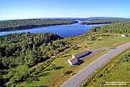 mobile home overlooking the Bras d’Or Lake on 1.52 acres sunny property with panoramic lake view for sale near Iona on Cape Breton Island, Nova Scotia