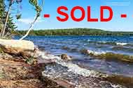 waterfront property at Bras d’Or Lake in Malagawatch on Cape Breton Island, Nova Scotia Canada for sale