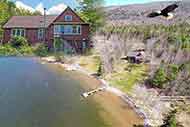 Oyster Beach House for sale by owner at Bras d‘Or Lake Marble Mountain Road Cape Breton Island