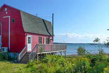 Red Ocean Cottage on 3.3 acres shorefront property for sale Cape Breton, Nova Scotia, Canada